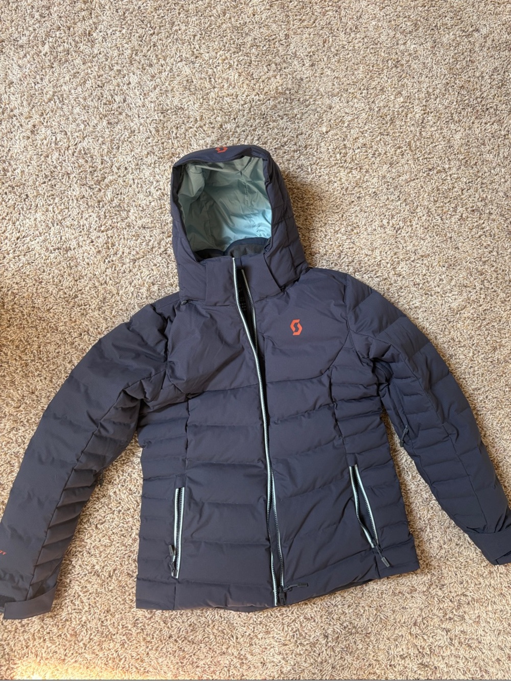 Scott Women's Hooded Puffer Jacket in Navy with Orange Logo